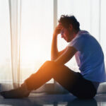 ManThinkingSitting